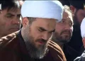 عکس/ پدر شهیده زهرا محمدی گلپایگانی، نوه ۱۴ ماهه رهبر شهید انقلاب